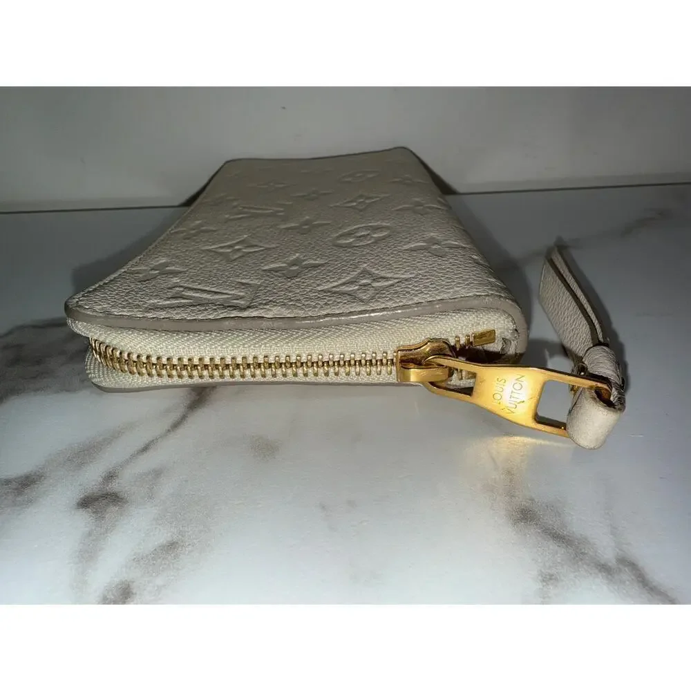 Louis Vuitton Zippy Wallet in Cream Empreinte Leather